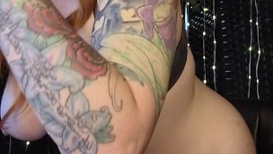 Redhead swallows a toy cock and vibrates her clit