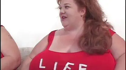 Fat bellied chick in red uniform rides one long stick