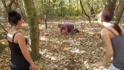 Training their old pet slave in the forest