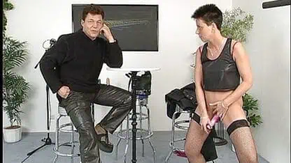 Stockinged slut with short hair gets pussy toyed at casting