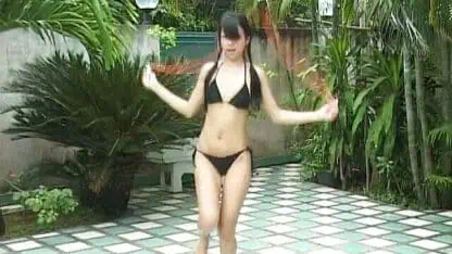 Asian hotties doing a photo shoot in a bikini