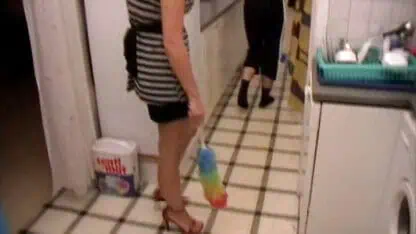 Poor Dude Must Clean Kitchen on Order of His Mistress